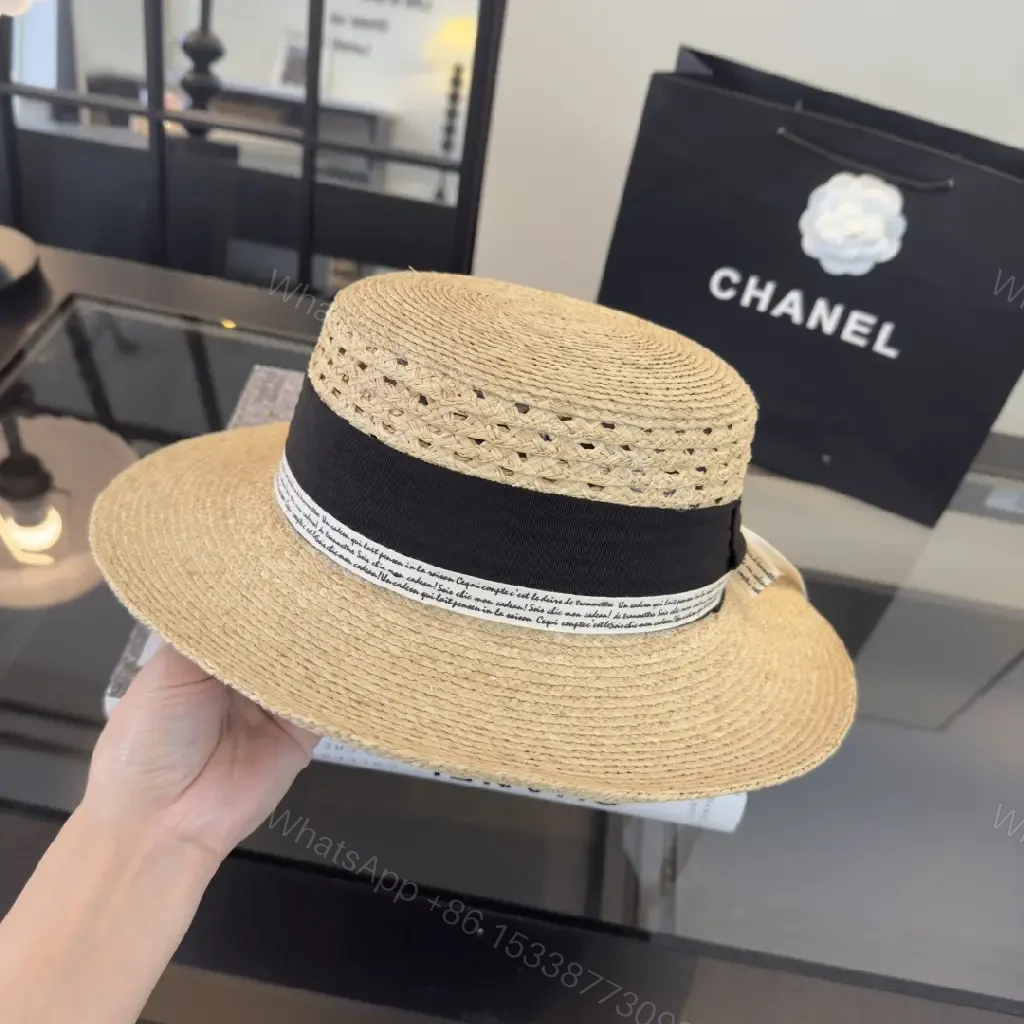 View 7 of Natural Straw Fedora Hat with Bow Ribbon Detail - Chanel Logo