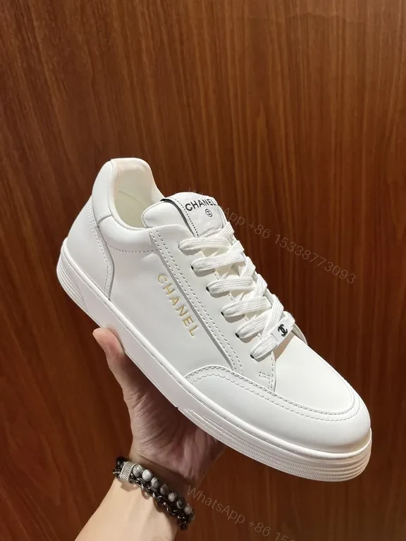 White Leather Sneaker with Gold Detailing â€” Modern Luxury Casual Sneaker — view 1