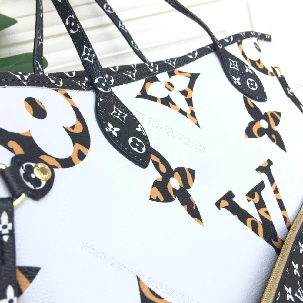 View 9 of Louis Vuitton Neverfull Monogram Giant Jungle MM White Havana 31Cm M44716