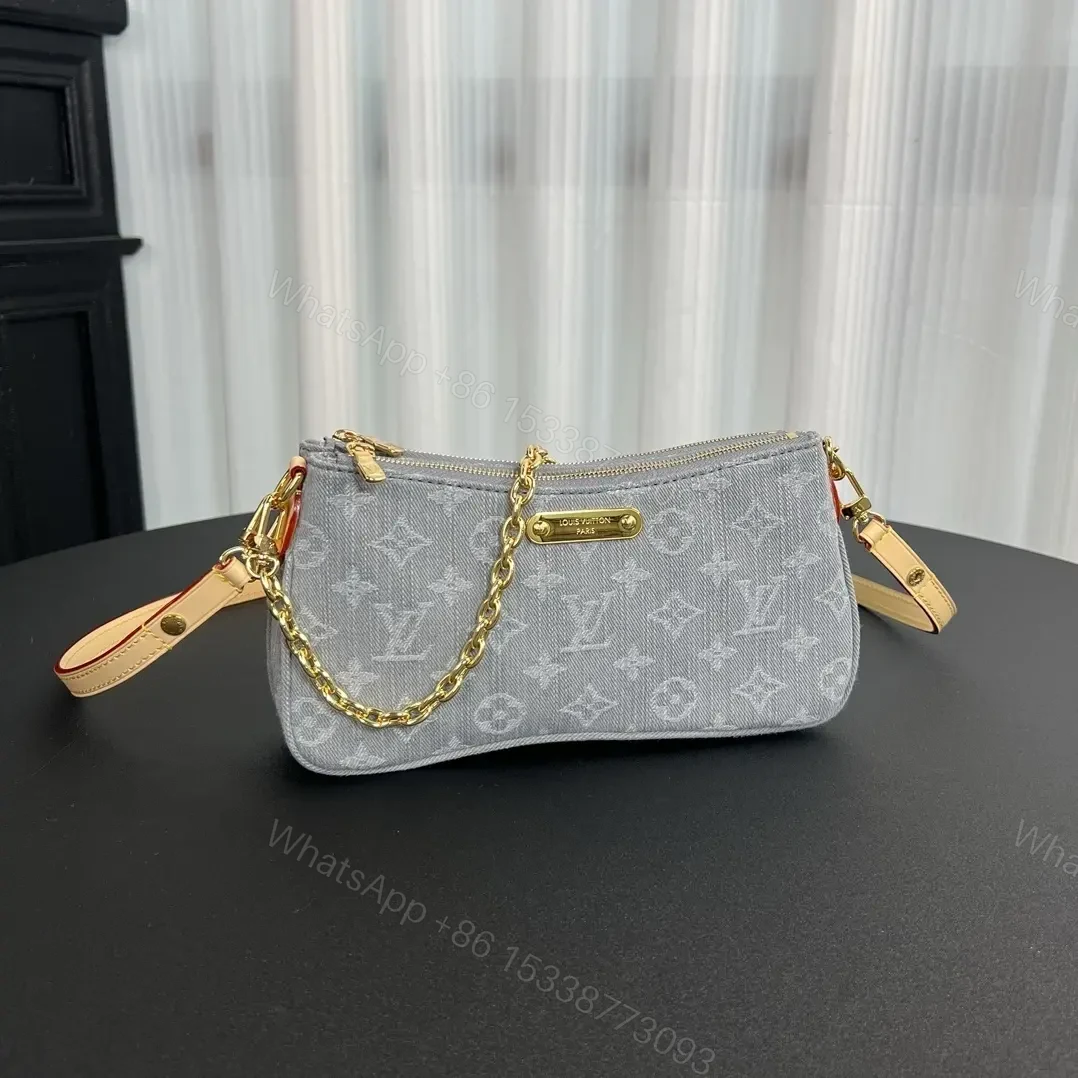 View 3 of Louis Vuitton Liv Pochette in Washed Denim
