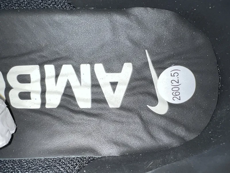 View 7 of Black Leather Low-Top Sneakers with White Swoosh - Luxury Streetwear