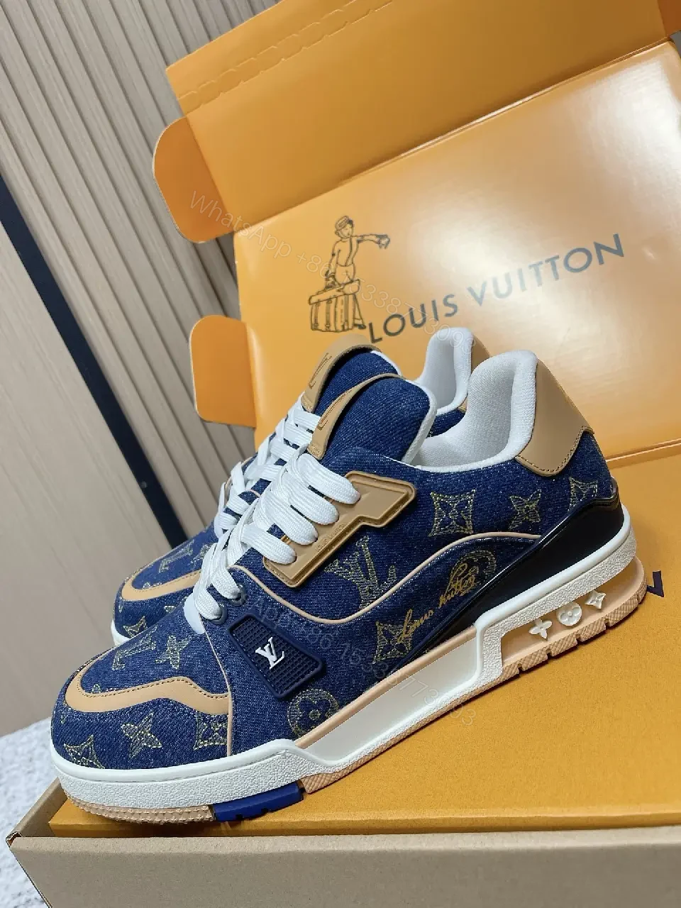 View 2 of Denim Monogram High-Top Sneakers: Luxury Streetwear Comfort