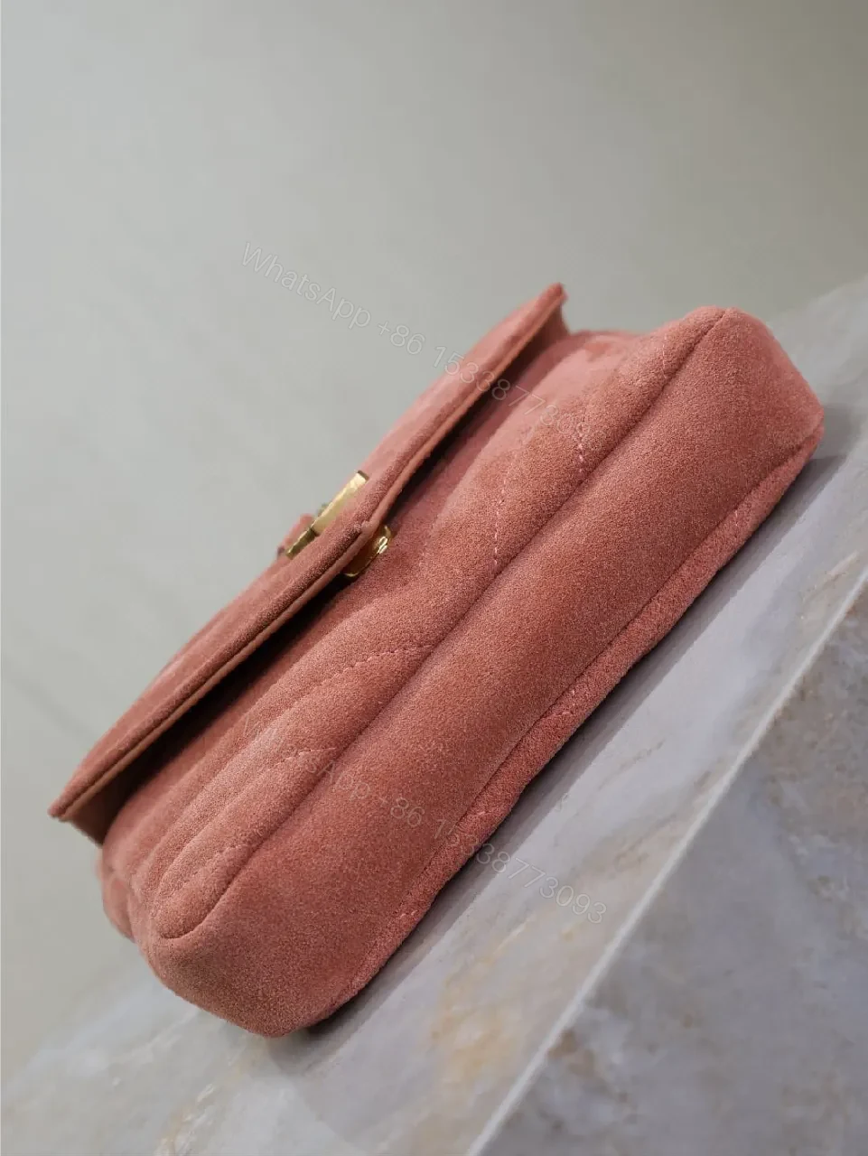 View 3 of Rosy Pink Quilted Mini Bag with Gold Hardware