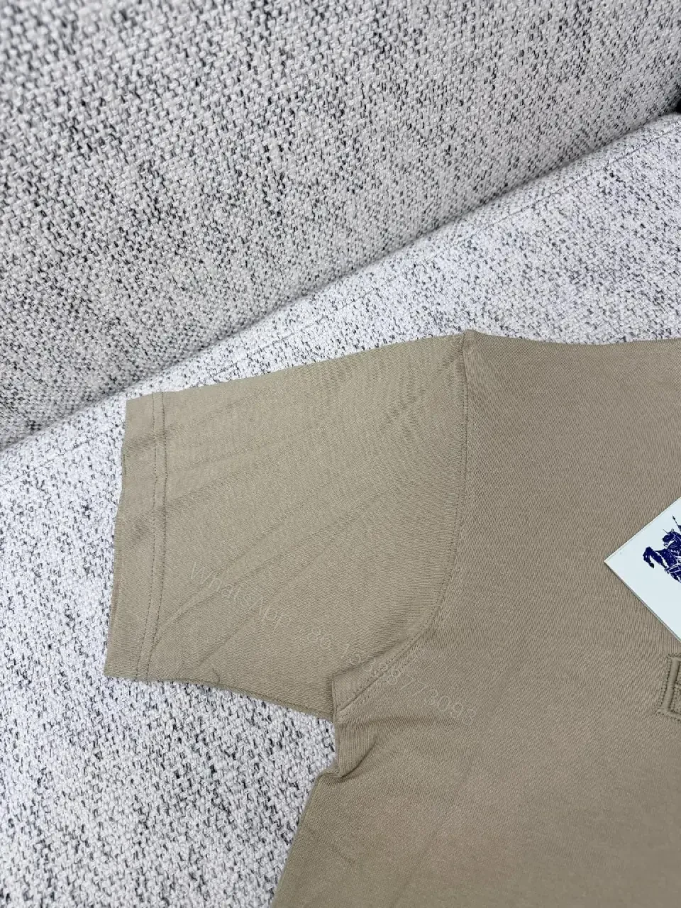 View 11 of Textured Cotton Tee: Subtle Embossed Logo, Everyday Luxury