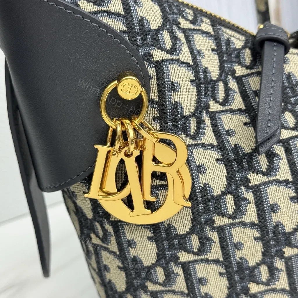 View 6 of Monogram Textured Bucket Bag: Black Leather Trim, Gold Hardware, Medium