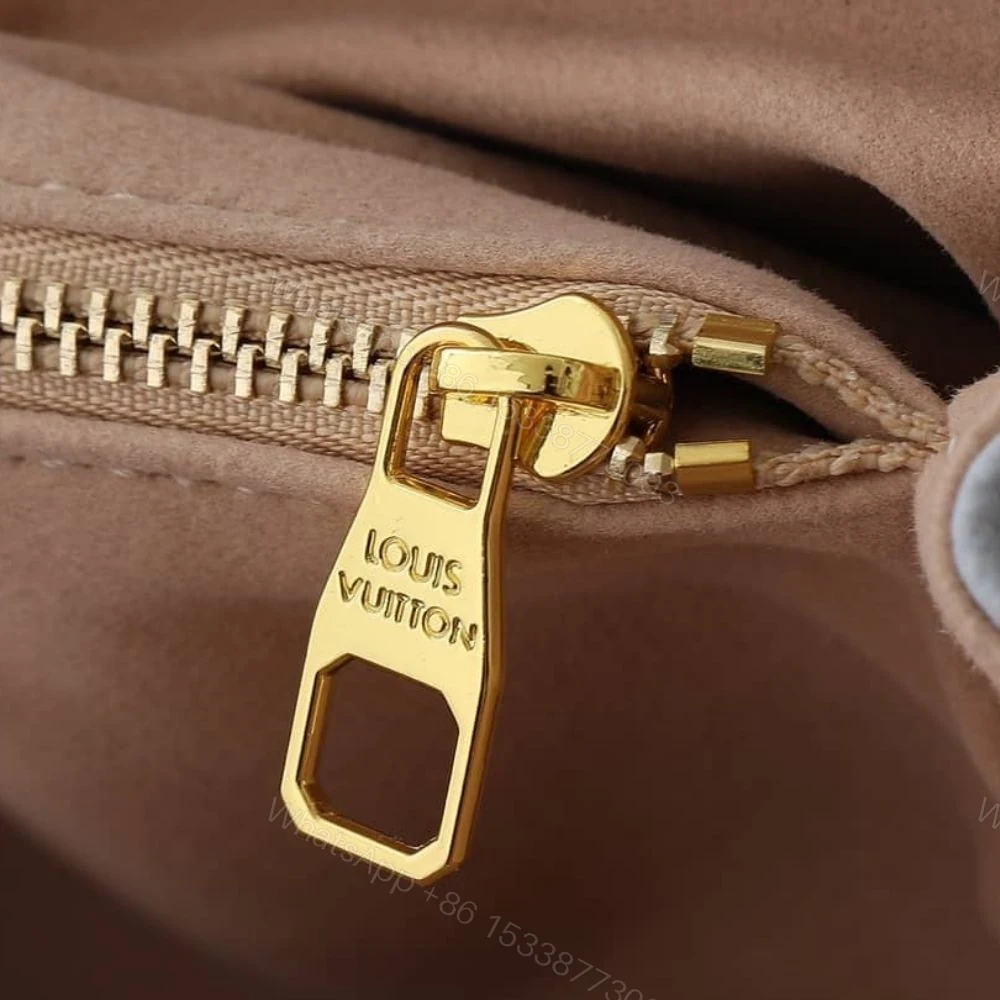 View 8 of Louis Vuitton Pochette Métis East West Coated Canvas Trianon 21Cm M12429