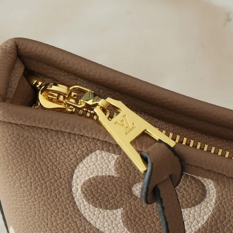 View 6 of Louis Vuitton Carryall PM Bicolor Monogram Empreinte Dove And Cream 29Cm M47180
