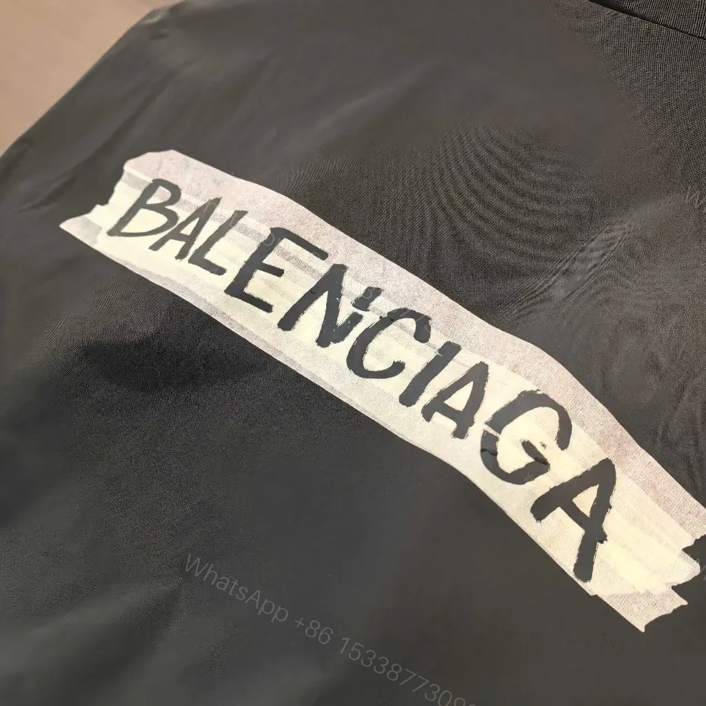 View 6 of Black Satin Windbreaker: Minimalist, Subtle branding, Packable jacket