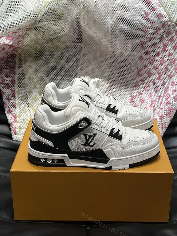 View 3 of White Leather High-Top Sneakers with LV Branding and Visible Hardware