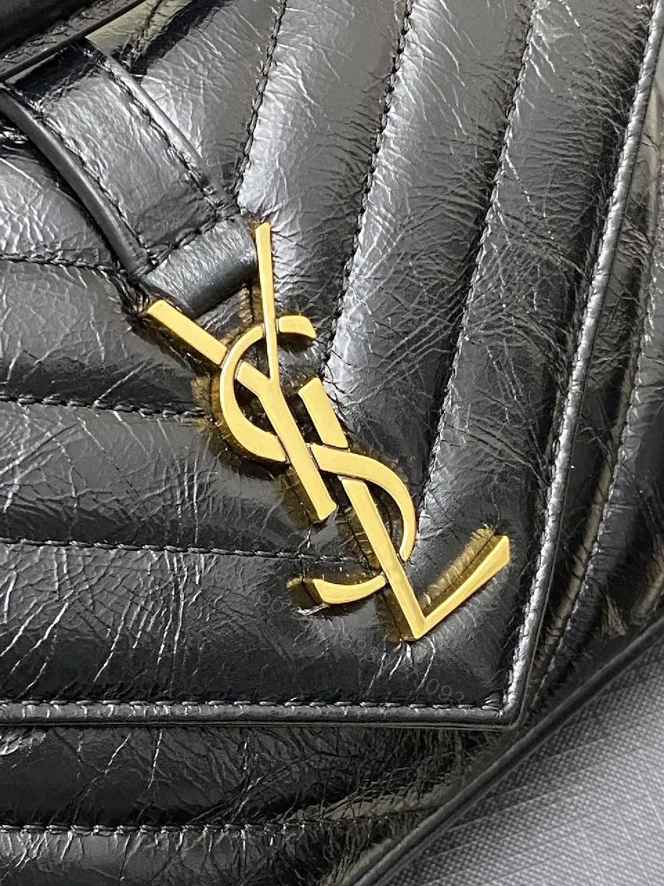 View 9 of Chic Quilted Crossbody: Black Leather, Gold Hardware, Compact Luxury