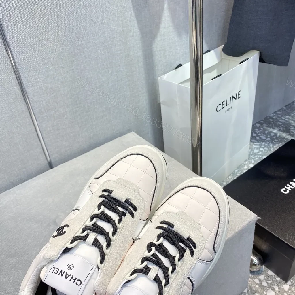 View 7 of White Leather-Trim Sneaker with Quilted Detail, Luxury Casual Sneaker