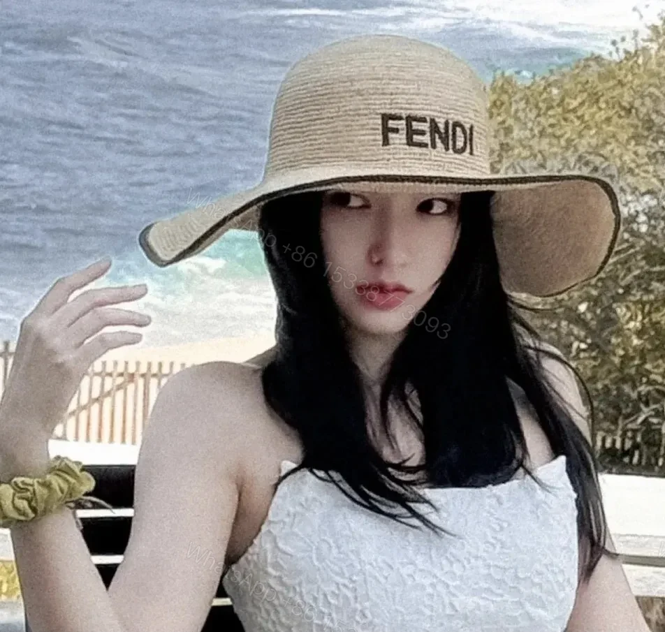 View 7 of Wide-Brim Straw Knit Hat: Bold Couture-Ready Sun Shield