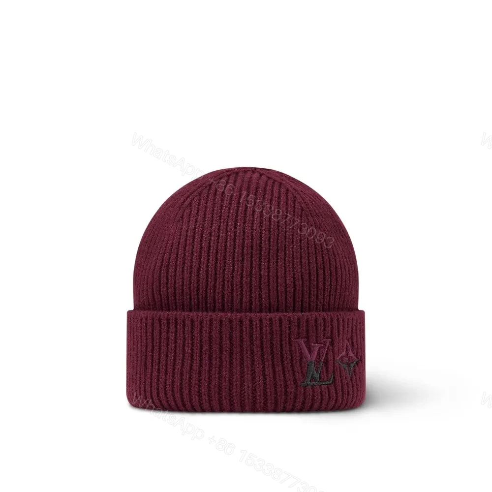 View 3 of Navy Knit Beanie with Subtle LV Emblem, Classic Style