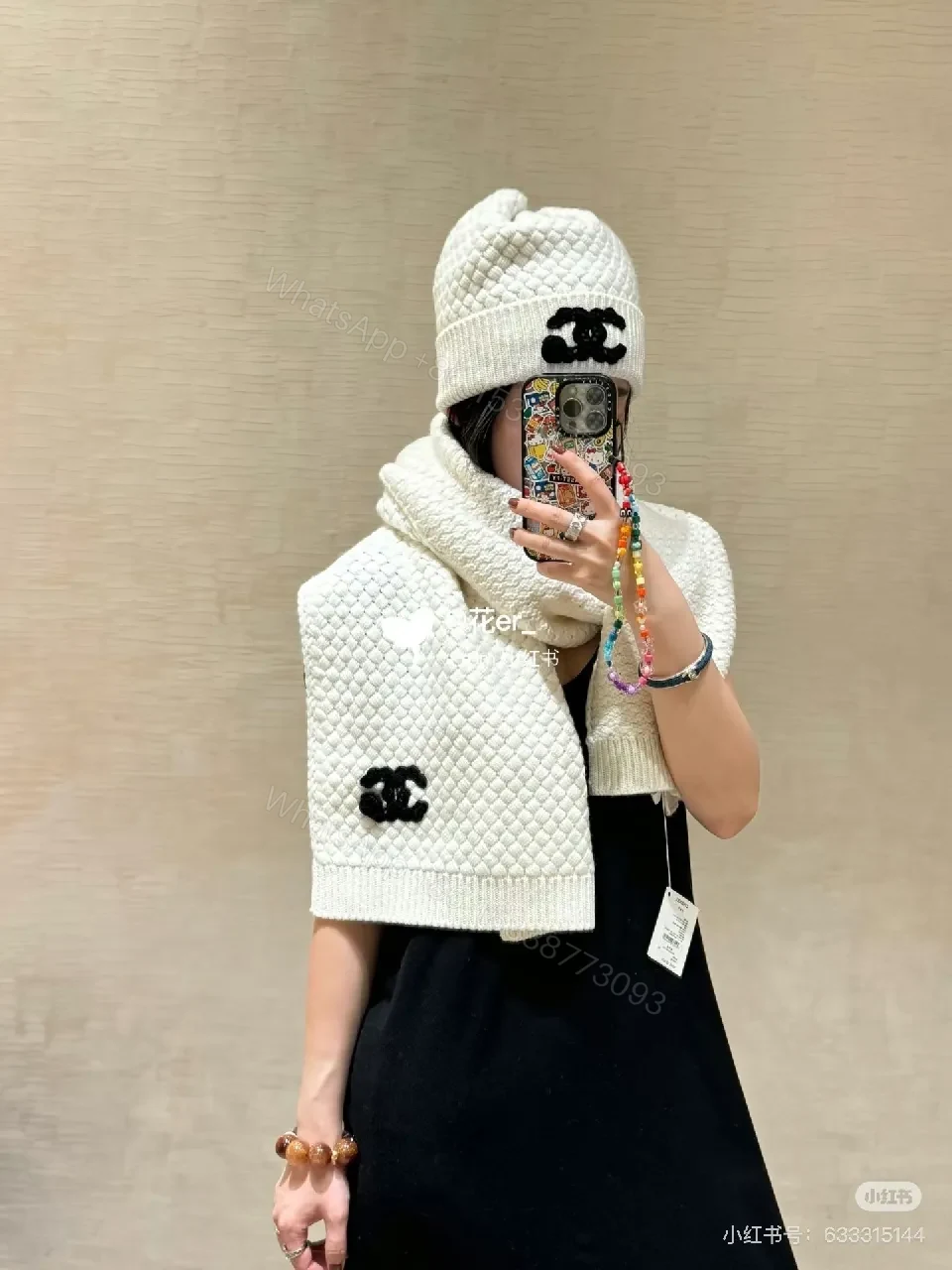 View 2 of Ivory Knit Set: Textured Luxury with Iconic Emblem