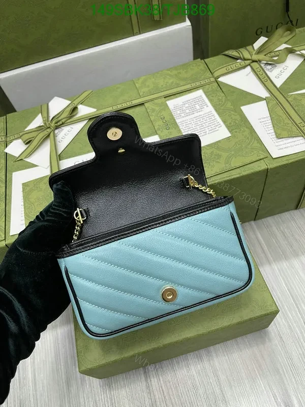 View 25 of Gucci Blue and Red GG Marmont Mini Leather Shoulder Bag featuring Textured Torchon Double G AS474
