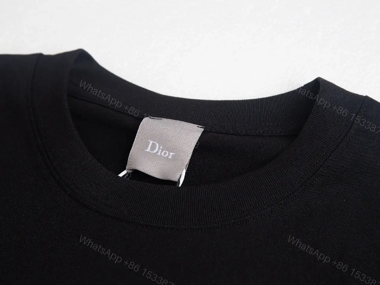 View 4 of Minimalist Black Tee: Luxe Subtlety, Durable Everyday Top
