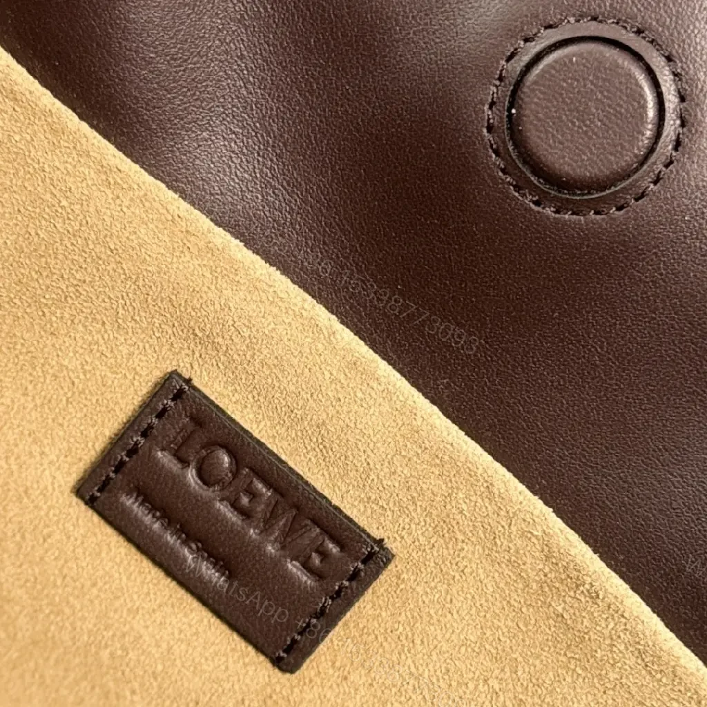 View 7 of Dark Leather Crossbody: Playful Animal Motifs, Compact Chic