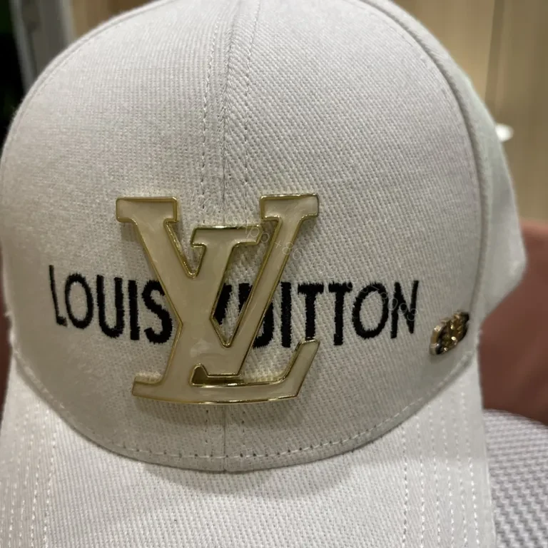 View 3 of Textured Cotton LV Cap: Gold Emblem Luxury Baseball Hat