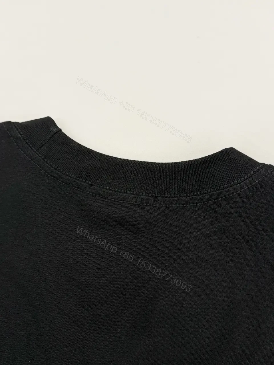 View 10 of Bold Black Cotton Tee: Subtle Luxe Dior Graphic