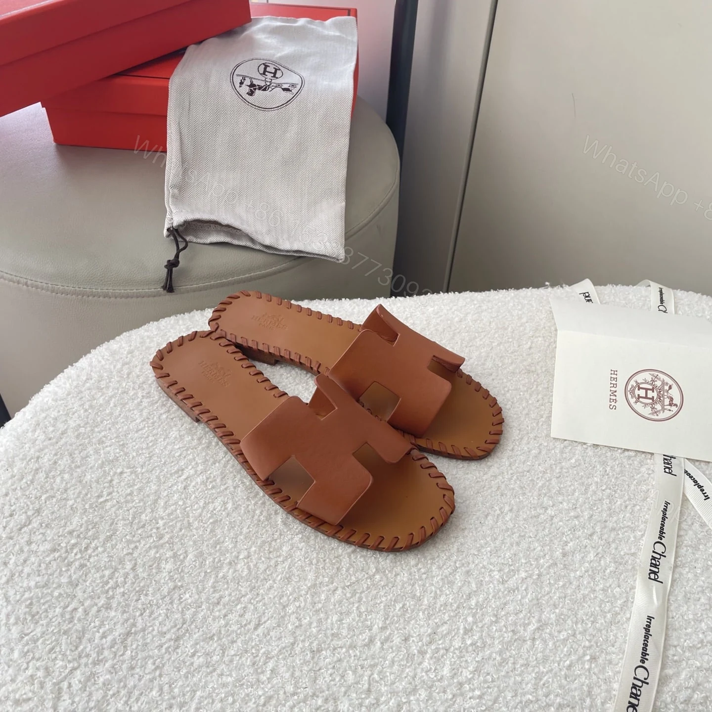 View 2 of HERMÈS ORAN SANDALS STITCHING IN BROWN