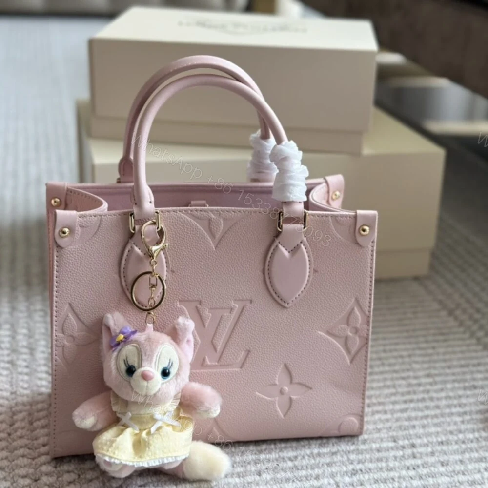 View 2 of Louis Vuitton Onthego PM Monogram Empreinte Pink Opale 25Cm M47135