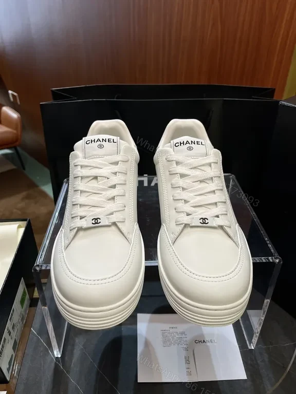 View 4 of White Leather Sneaker with Gold Detailing â€” Modern Luxury Casual Sneaker