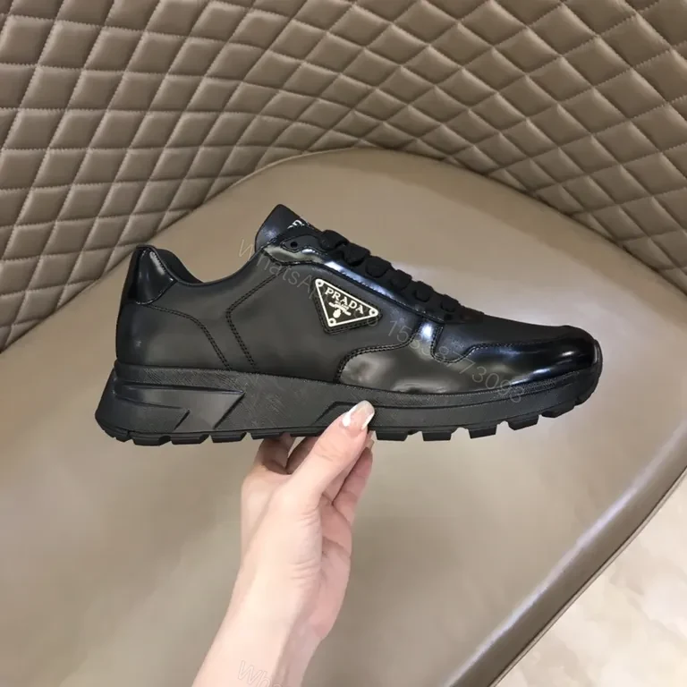 View 4 of Prada Black Leather Patent-Panel Sneakers, Discreet Luxury