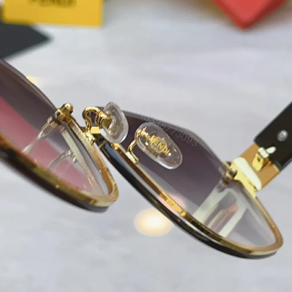View 10 of Gold Frame Pink Gradient Sunglasses with FENDI Logo