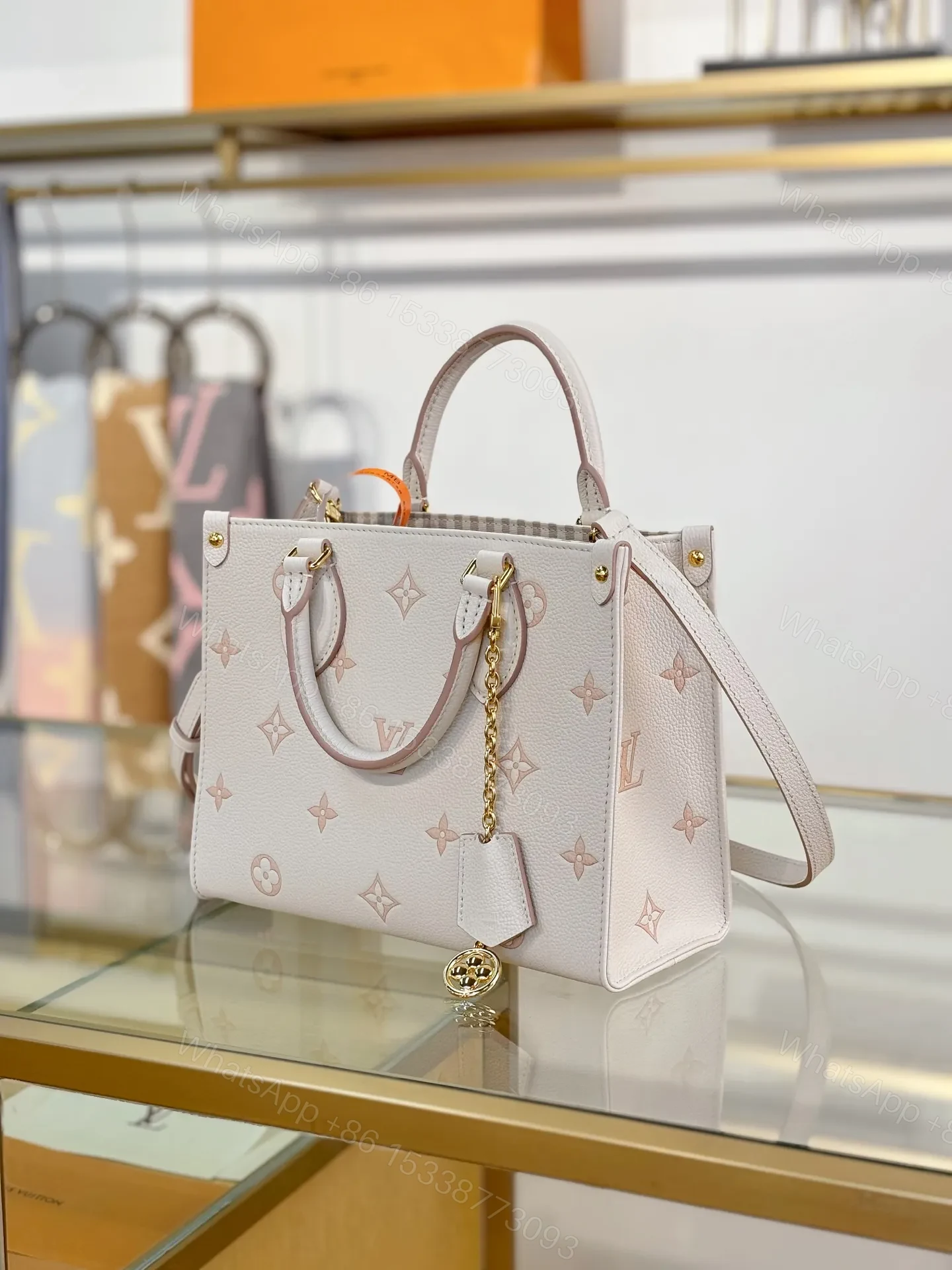 View 2 of Louis Vuitton OntheGo PM TH Tote Bag