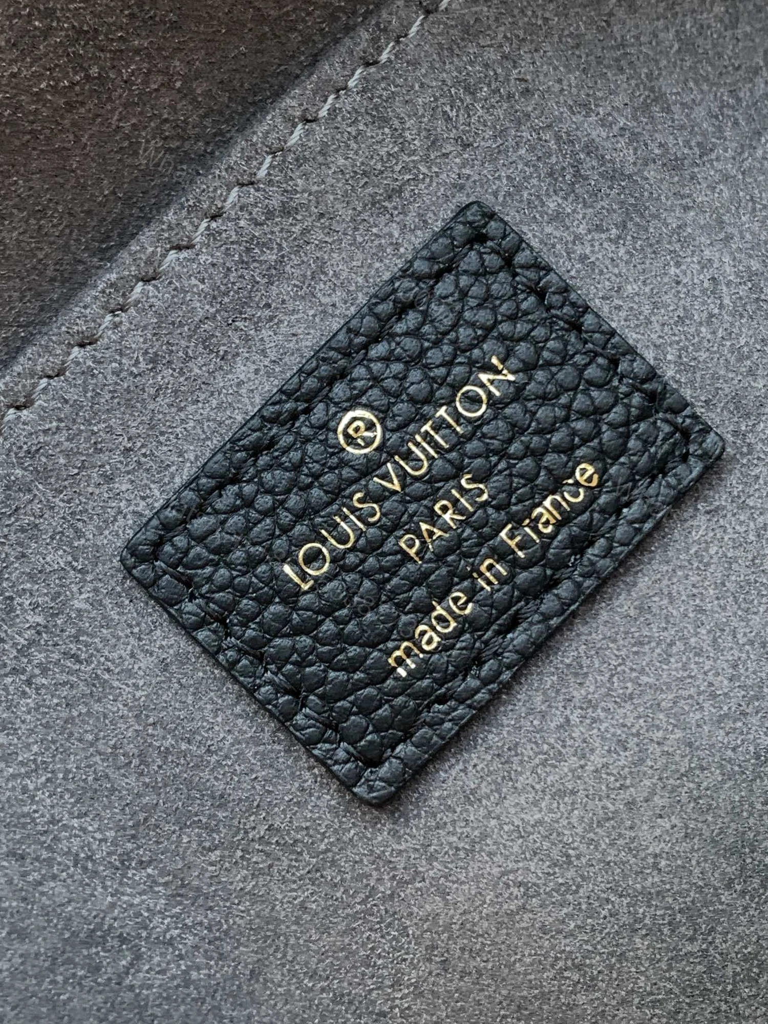 View 9 of LV MADELEINE 30 IN BLACK MIX WHITE MONOGRAM CALFSKIN EMBOSSED LOGO