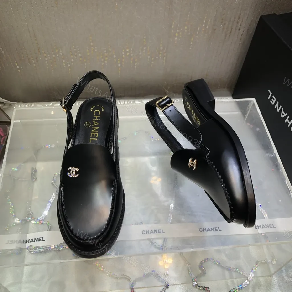 View 8 of Black Leather Mules with Gold Logo Hardware, Minimal Slider Mule