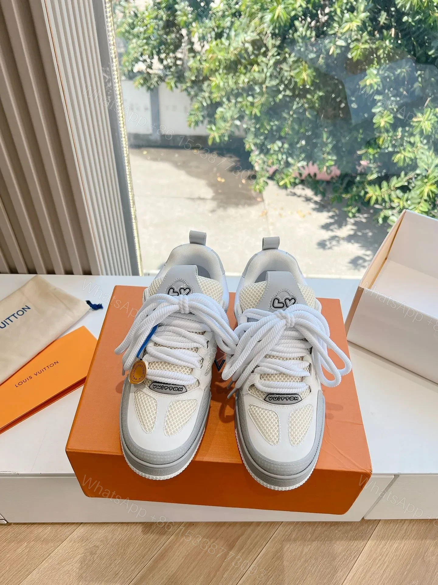 View 5 of LV Women White Mesh And Leather Sneakers