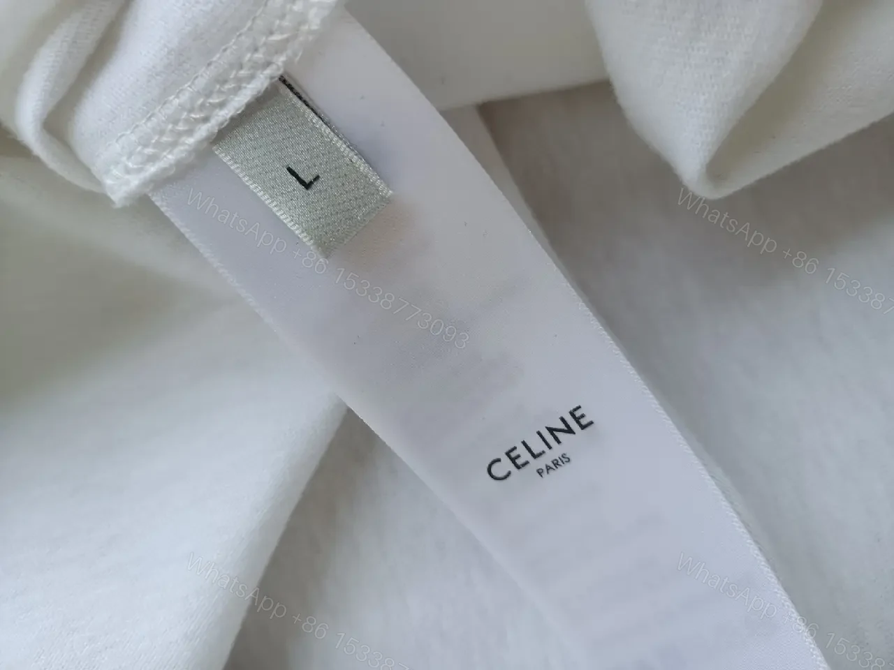 View 2 of Minimalist White Cotton Tee - Relaxed Luxe Comfort