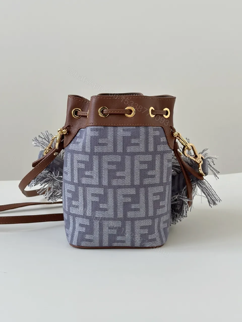 View 8 of Chic Canvas Bucket Bag with Leather Trim & Fringe Detail