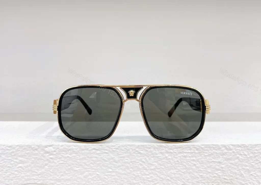 View 2 of Gold-Tone Frame Designer Sunglasses with UV400 Protection - Unisex