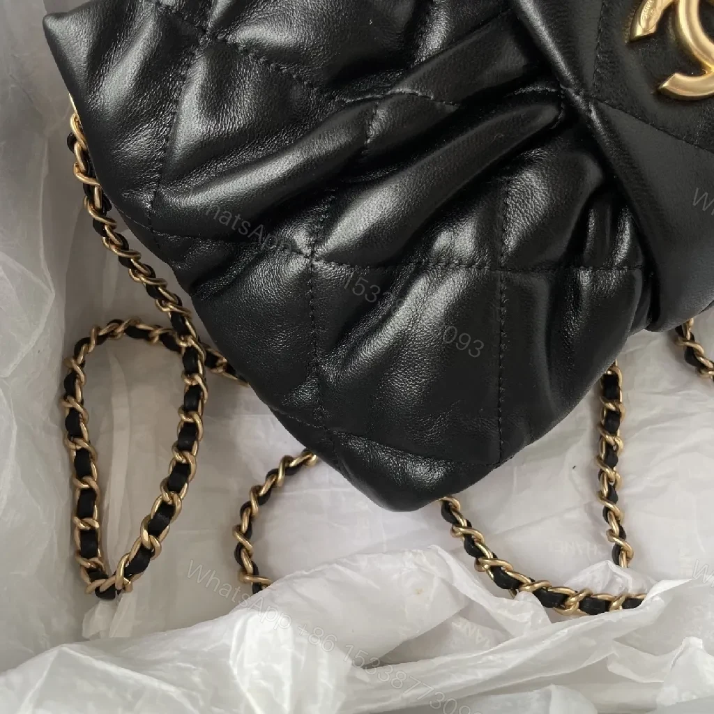 View 2 of Quilted Black Leather Handbag with Gold Hardware - Chic Style