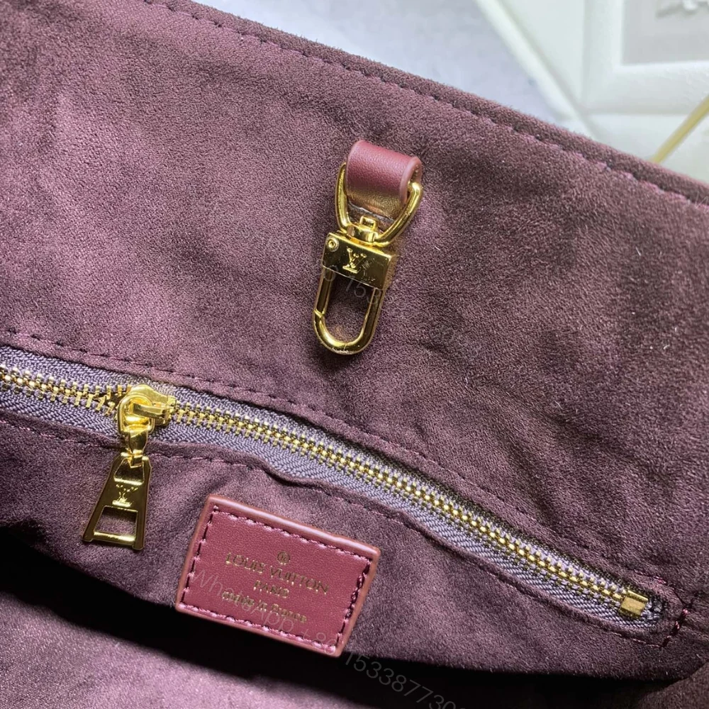 View 6 of Louis Vuitton Onthego MM Monogram Empreinte Wine Red 35Cm M46601