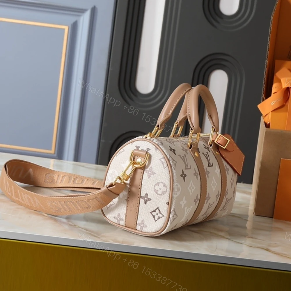 View 3 of Louis Vuitton Keepall Bandoulière 25 Monogram Beige 25Cm