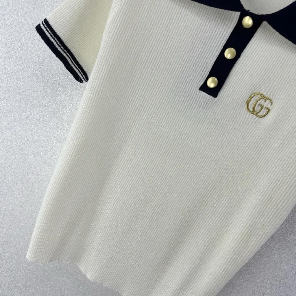 View 2 of Cream/Navy Ribbed Polo Shirt with Gold Accents