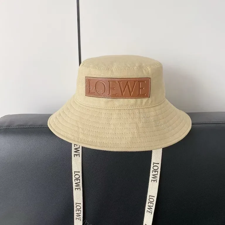View 2 of Beige Cotton Bucket Hat with LOEWE Patch - Luxury Streetwear