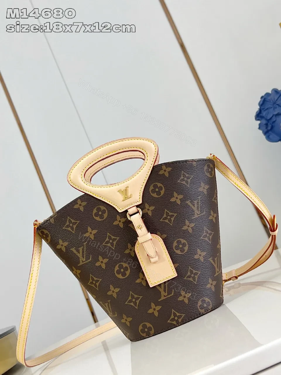 View 2 of Monogram Canvas Bag: Sculpted Top Handle, Everyday Luxury