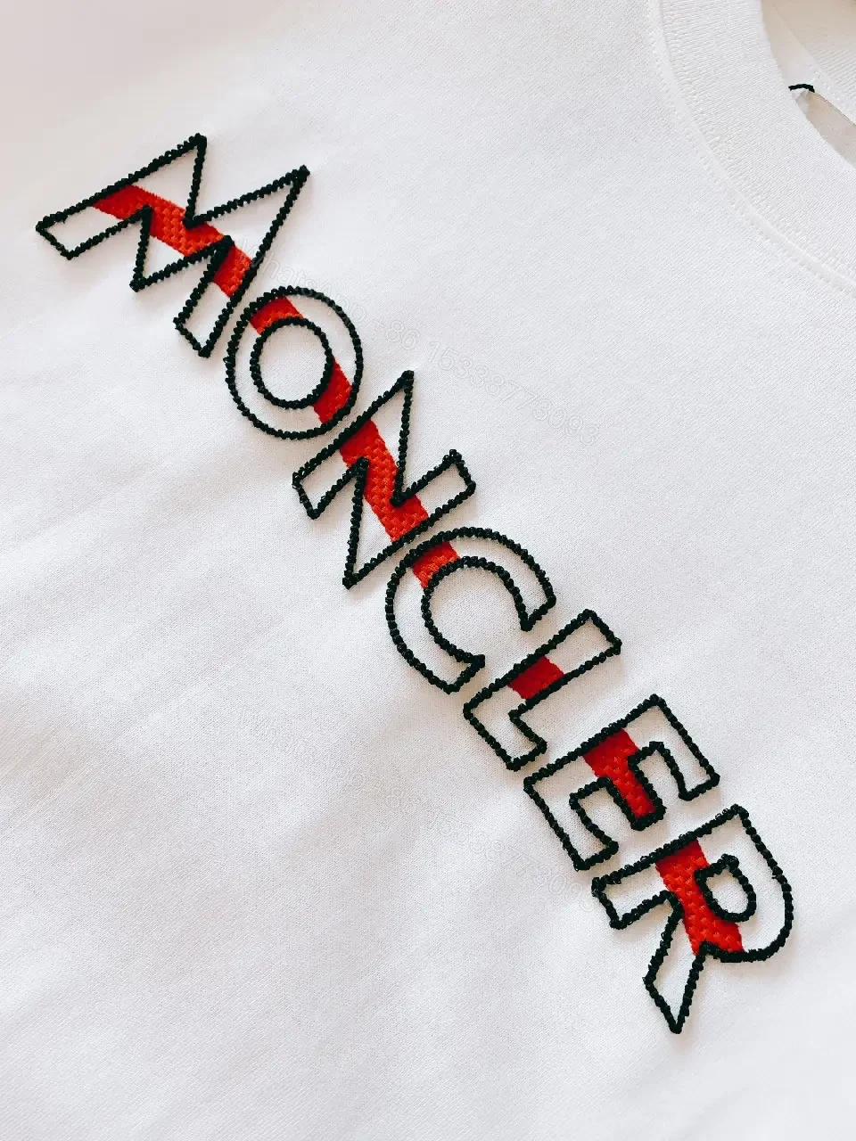 View 10 of White Cotton Logo Tee – Modern Luxury Essential T-Shirt