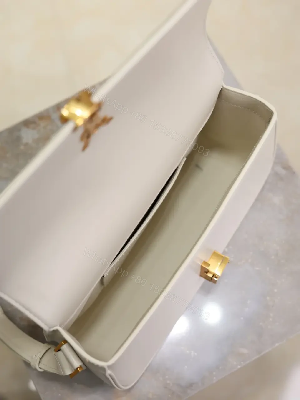 View 4 of Ivory Leather Crossbody — Gold-Accent, Compact, Everyday Ease