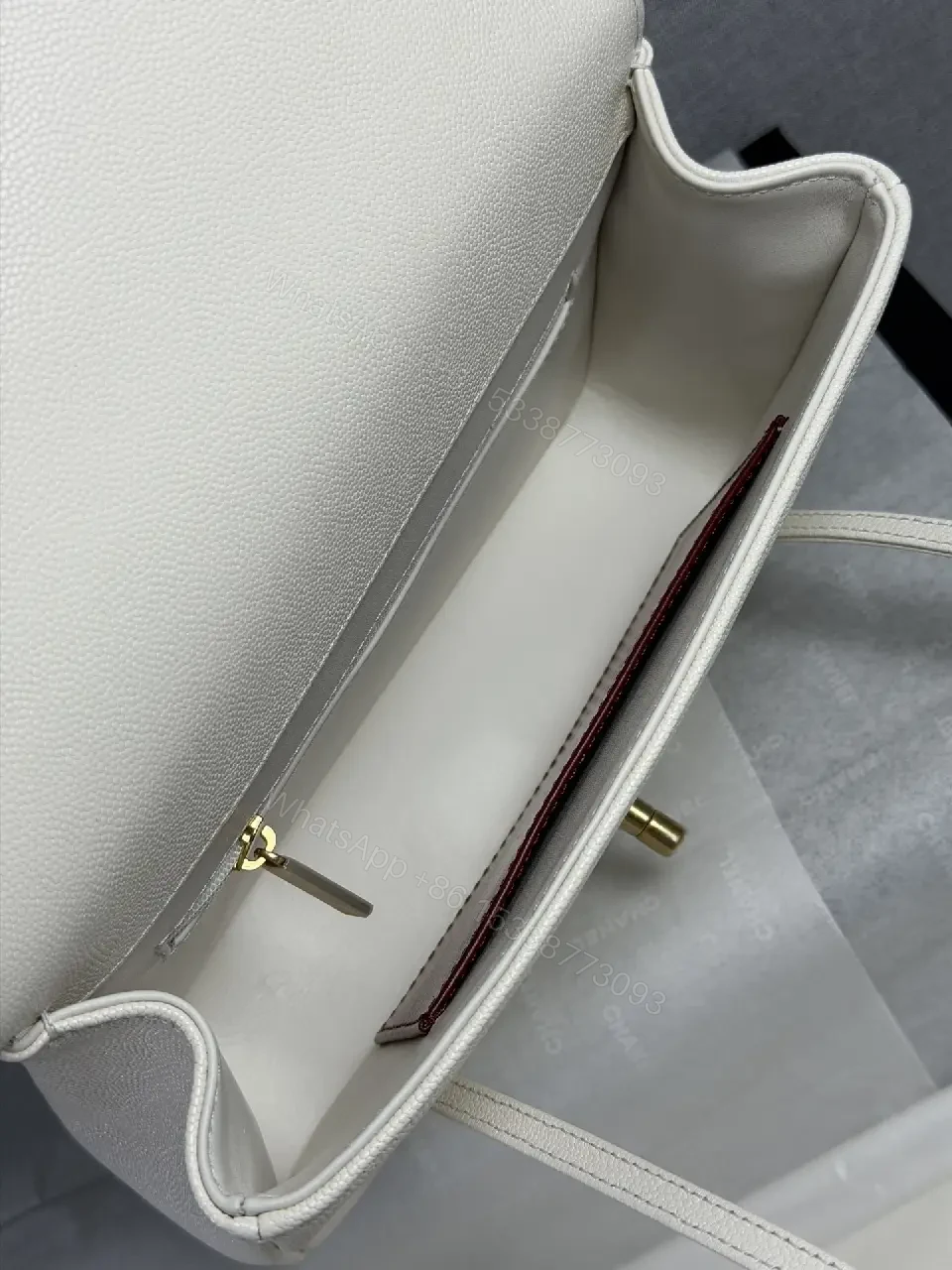View 4 of Minimalist White Pebble Leather Shoulder Bag with Gold Hardware