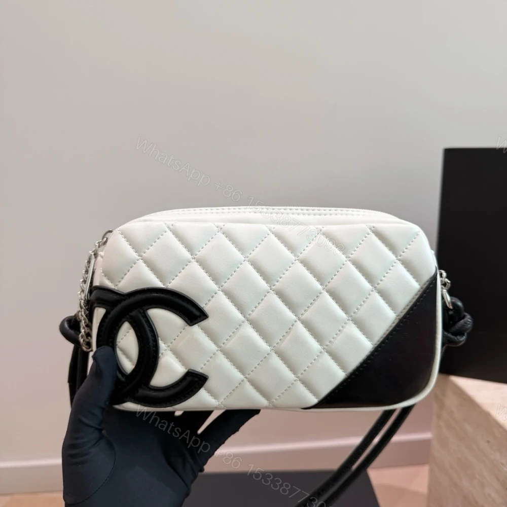 View 2 of Chanel Cambon Pochette Quilted Leather White And Black 22Cm