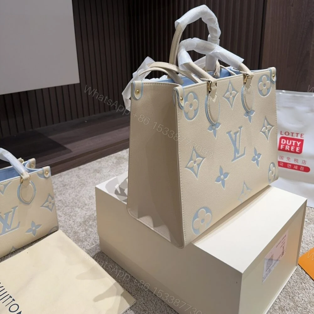View 4 of Louis Vuitton Onthego PM Candy Blue 25Cm M46833