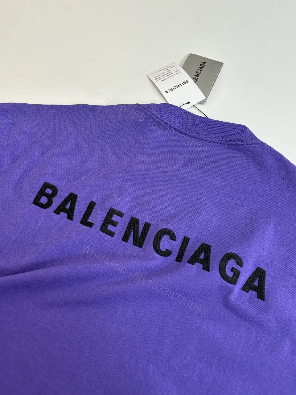 View 7 of Oversized Purple Logo Tee — Luxury Casual, Minimal Branding