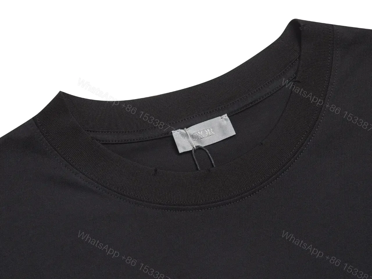 View 6 of Chic Black Cotton Tee with Subtle Metallic Logo, Luxury Everydaywear