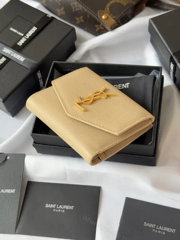 View 3 of Chic Nude Leather Wallet with Gold Hardware - Compact Luxury