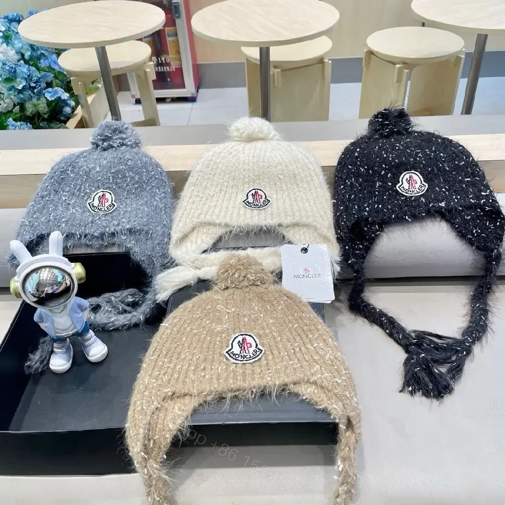 View 7 of Cozy Boucle Knit Beanie with Moncler Patch – Textured Warmth
